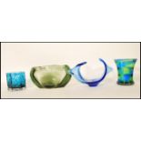 A selection of 20th Century retro studio glass to include a blue and green rainbow glass vase in the