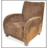 Lignet Roset - A late 20th century art deco shaped easy / lounge chair / armchair having an art deco