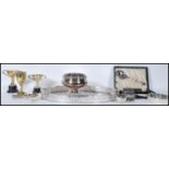 A collection of silver plated items to include 2 silver plated trophies, silver plated Viners
