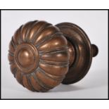 A 19th Century Victorian large bronzed door handle / pull. Gadrooned knop handle retaining