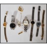 A collection of vintage 20th century ladies and gents watches to include a black face Seiko, white