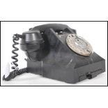 A vintage  20th century G.P.O. Bakelite Telephone, a 330L model marked FWR 60/2 with drawer to