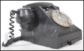 A vintage  20th century G.P.O. Bakelite Telephone, a 330L model marked FWR 60/2 with drawer to