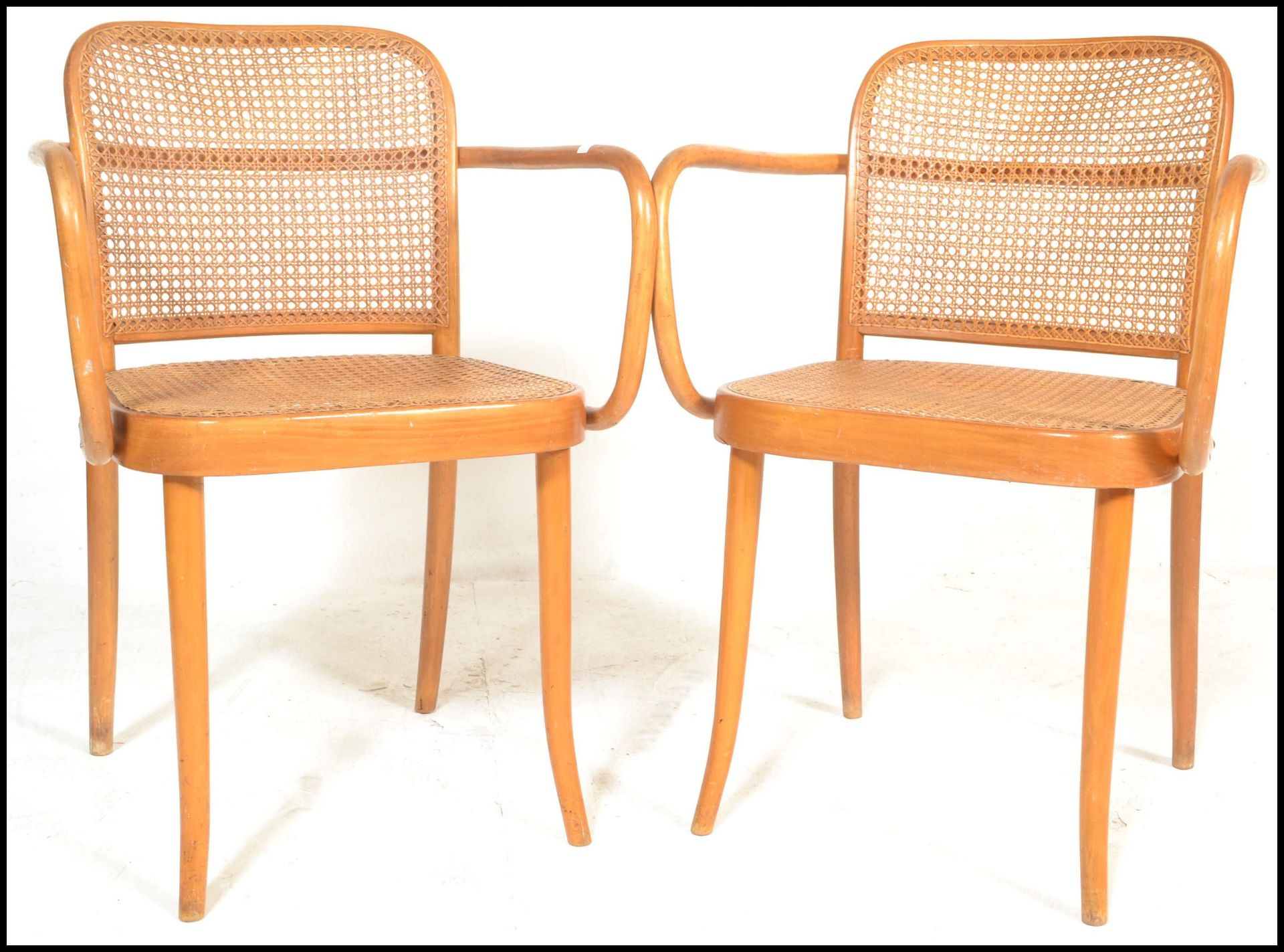 A pair of vintage 20th Century bentwood armchairs by Ligna (Czechoslovakia),  rattan weave