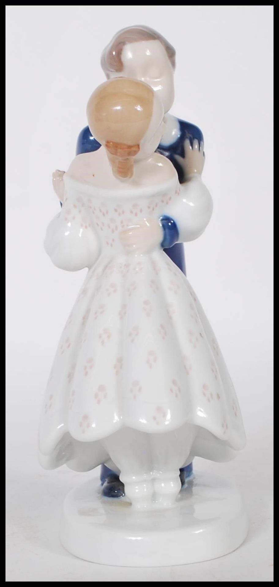 A B & G Danish porcelain figurine of a husband and wife kissing on round base. Marked B&G Denmark to - Bild 2 aus 6