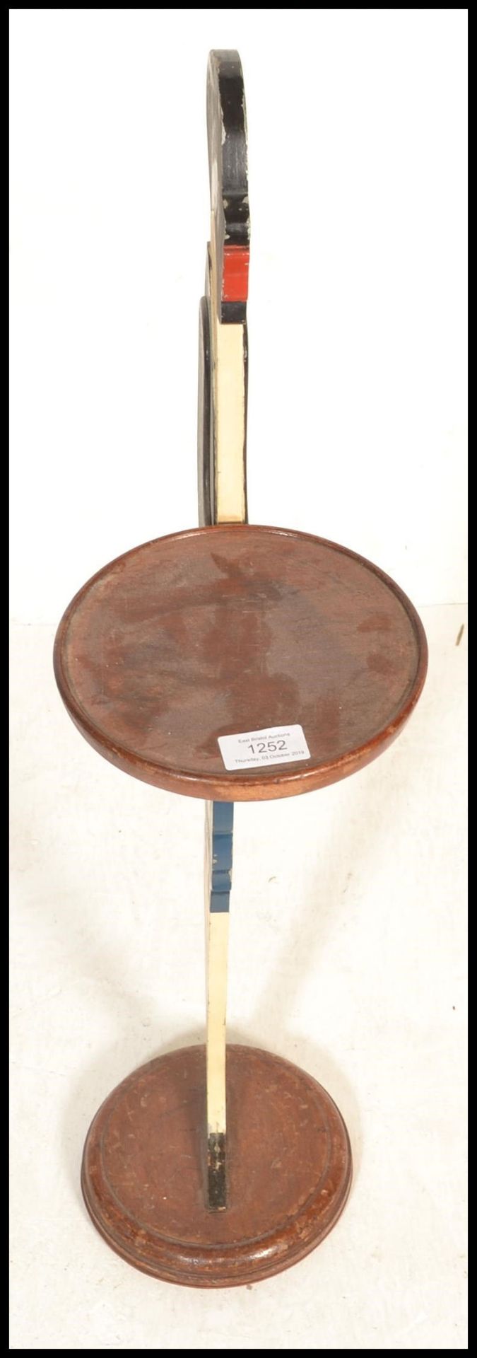 A 1930's Art Deco dumb waiter constructed from a wooden butler holding a tray raised on a stepped - Image 2 of 4