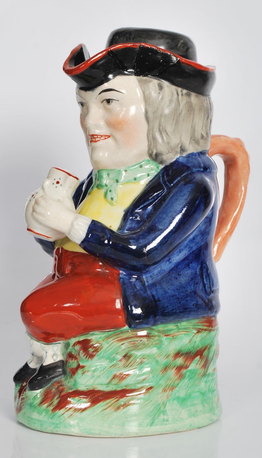 A early 19th Century Staffordshire lidded Toby fillpot jug, the gentleman being dressed in a - Bild 2 aus 4