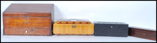 A collection of vintage 20th Century wooden boxes to include a contrasting wood jewellery box having