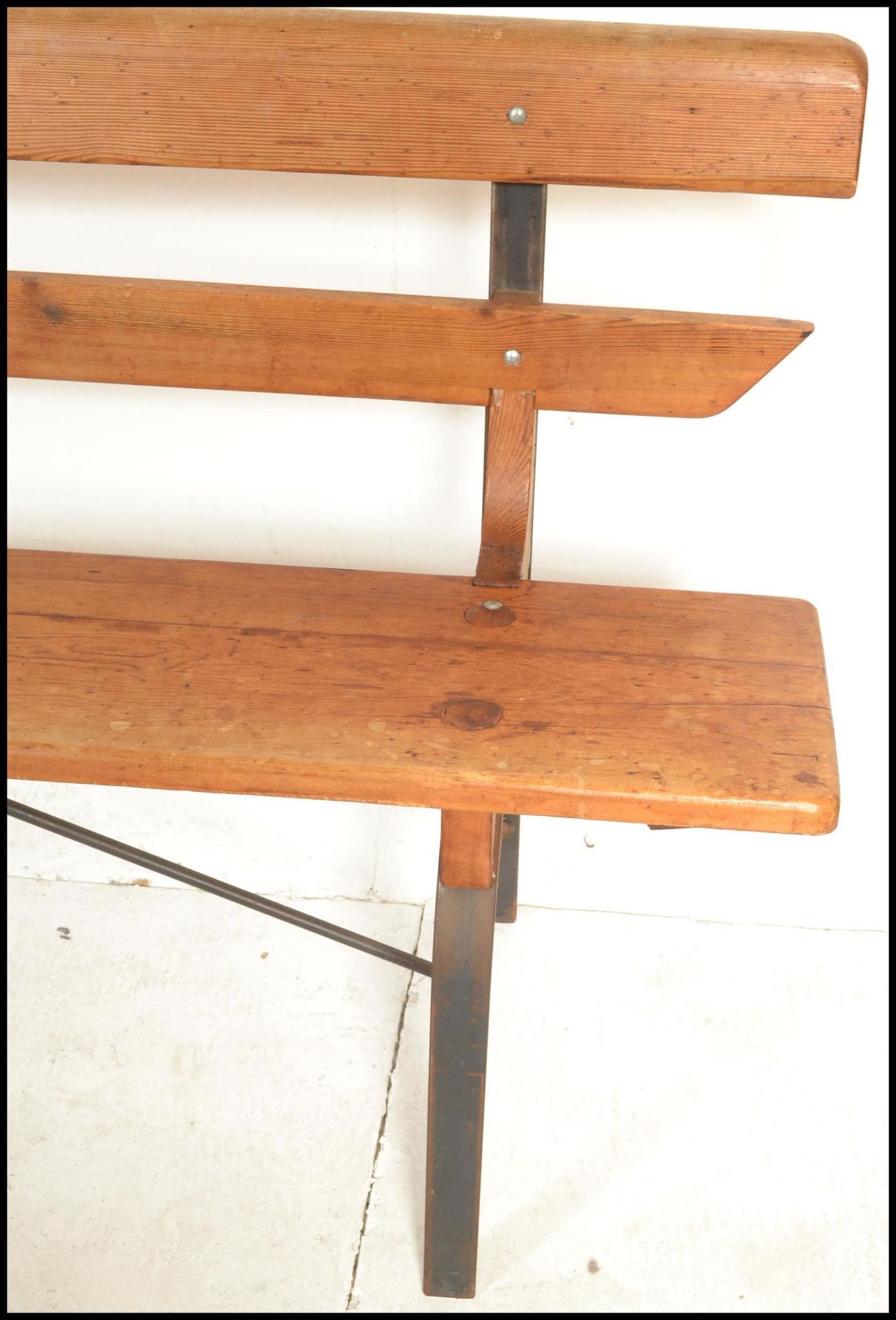 A 20th Century Victorian style pine station bench, raised on upright metal supports with plank - Bild 3 aus 6
