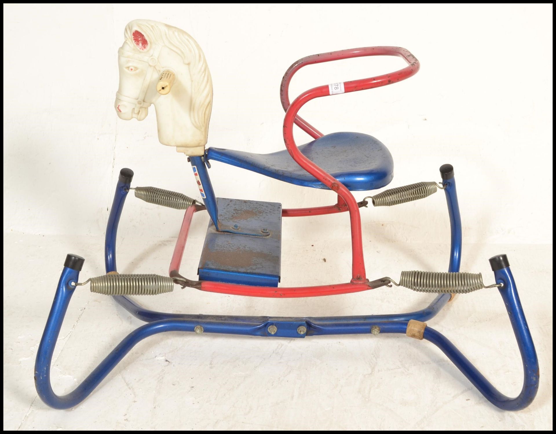 A vintage / retro mid century childs  tin plated Triang rocking horse set on springs on a tubular - Bild 2 aus 5