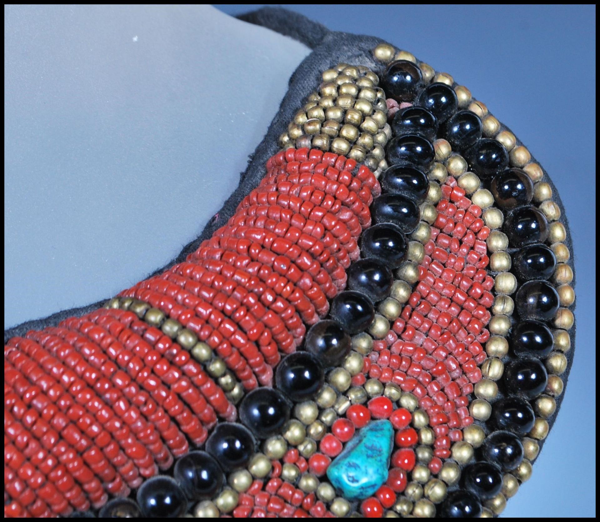 A 20th Century Tibetan tribal collar necklace constructed from a fabric panel stitched with red - Image 6 of 17