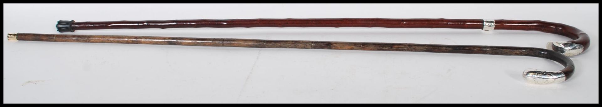 Two 20th Century walking stick canes to include a bamboo walking stick with a crook handle with a - Bild 3 aus 8