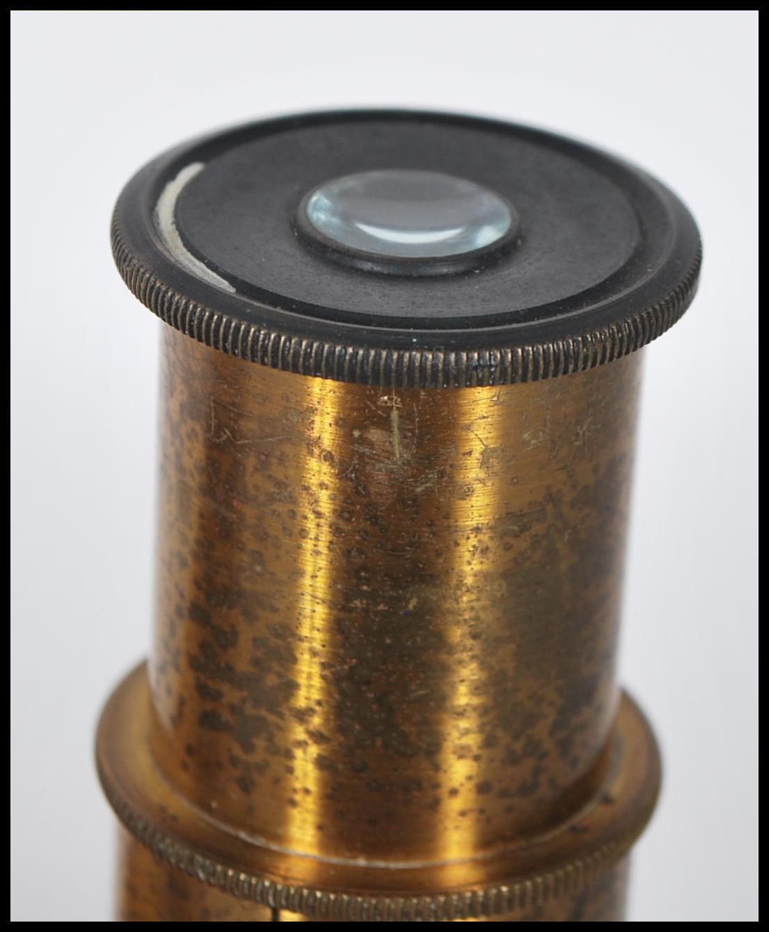 A late 19th Century brass students pocket cased microscope, adjuster to side fitted in a hinged - Image 5 of 7