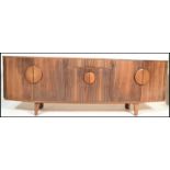 A retro mid century Danish Inspired crendenza sideboard. Raised on squared legs with a wide and deep