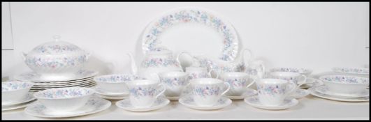 A vintage Wedgwood china tea / dinner service in the Angela pattern to include dinner plates, side