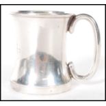 Hunting interest- A silver hallmarked toddy cup of simple form having a plane shaped handle with