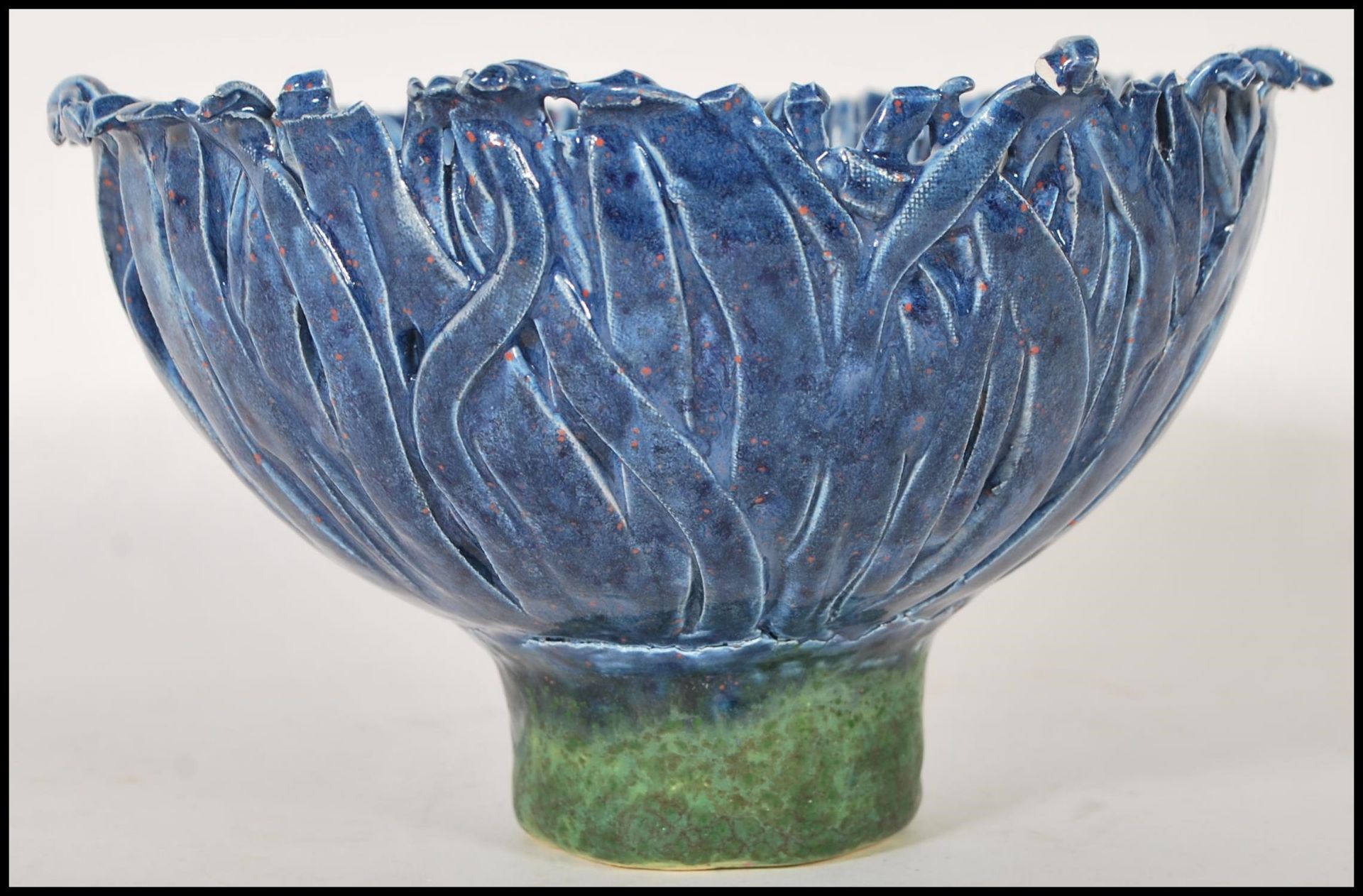 Jane Harding - A 20th Century vintage studio art pottery bowl in the form of a blue flower raised on