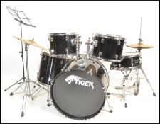 A Yamaha Gigmaker six piece drum kit consisting of bass drum, tom toms and snare drum with hit hat