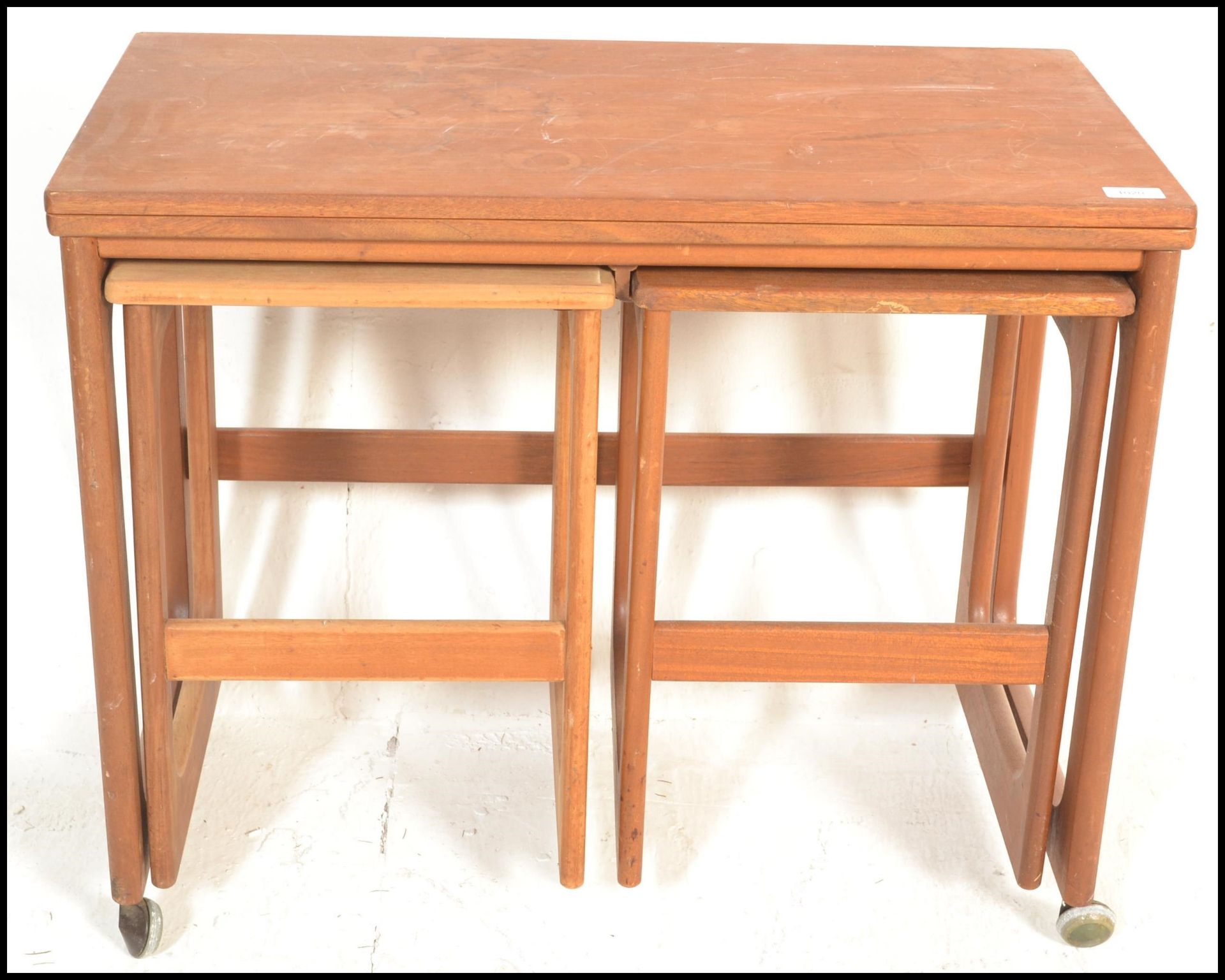 A vintage mid 20th Century McIntosh teak wood nest of tables with folding occasional top and 2 small - Bild 3 aus 4