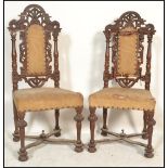 A pair of 19th century walnut Carolean revival hall chairs. Each raised on turned legs with