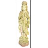 A 20th century Oriental South East Asian reconstituted stone garden statue ornament in the form of a