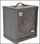Musical Equipment. A Roland Cube 100 Bass guitar amplifier CB-100  bearing serial no 2745726 - ac