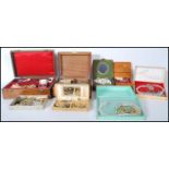 A large collection of 20th century costume jewellery to include enamel and stone set yellow and
