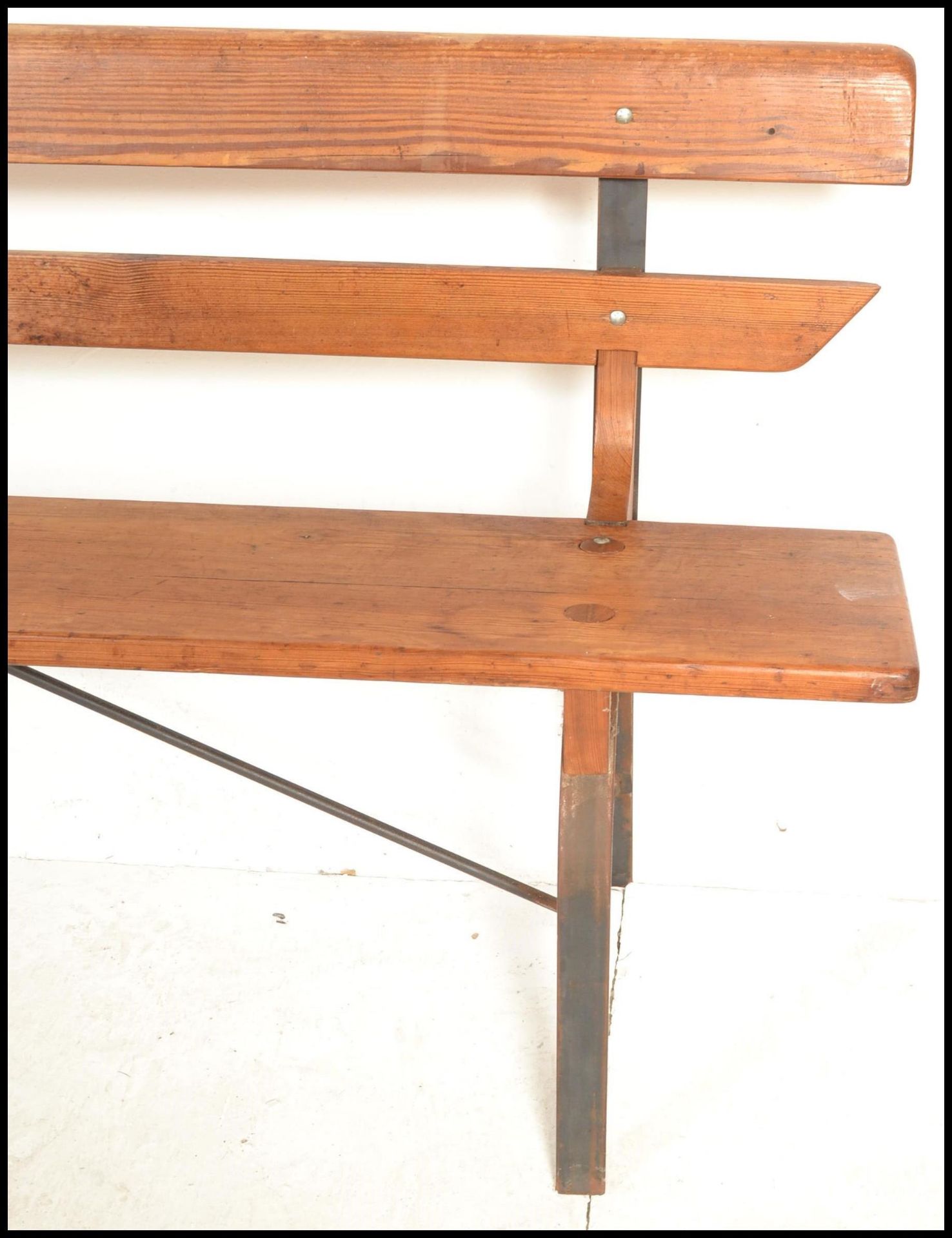 A 20th Century Victorian style pine station bench, raised on upright metal supports with plank - Bild 5 aus 6