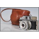 A rare vintage mid 20th Century 1950's Japanese super miniature Hit spy camera complete in leather