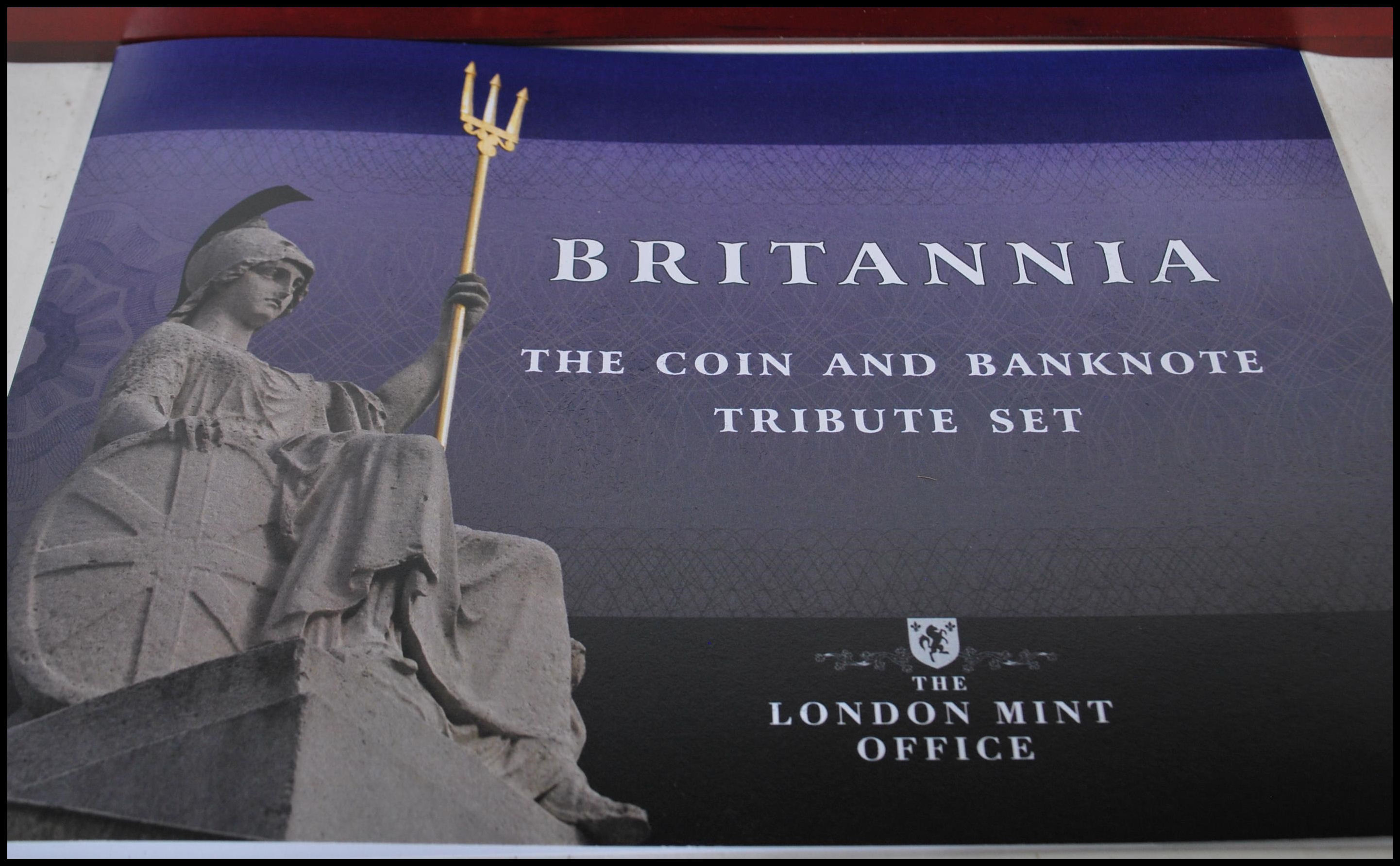 BRITANNIA THE COIN AND BANKNOTE TRIBUTE SET with a certificate, in a fitted case, blue Bank of - Image 11 of 12