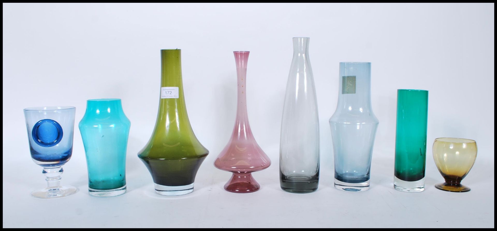 A selection of vintage retro 20th Century coloured studio glass vases of various forms to include