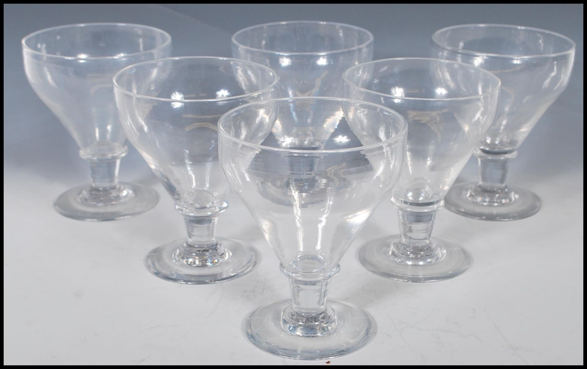 A group of six 19th Century Georgian rummer glasses having tapering bowls with capstan stems - Bild 2 aus 15