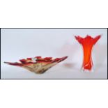 Two pieces of vintage 20th Century retro glass to include a red ombre bowl of twisted form having