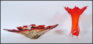 Two pieces of vintage 20th Century retro glass to include a red ombre bowl of twisted form having