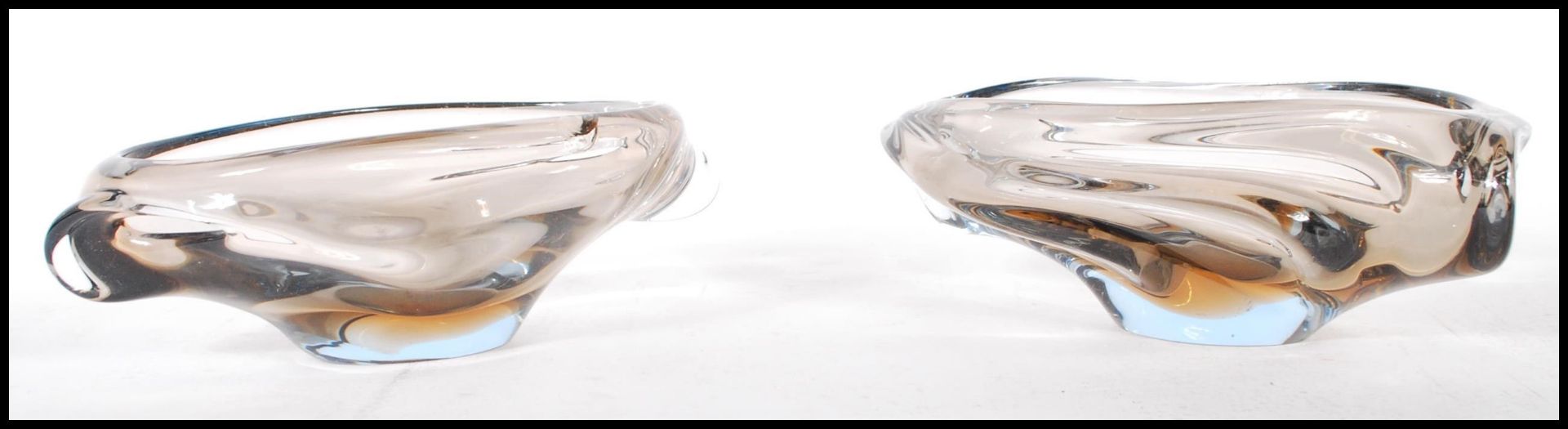 Two pieces of retro 20th Century Continental heavy studio glass dishes of scalloped asymmetric