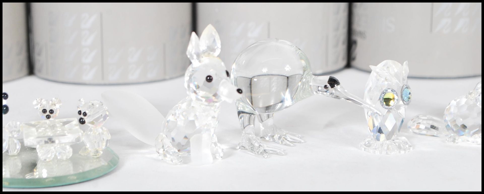 A collection of Swarovski crystal cut glass figurines to include the three bears, a toucan, a - Bild 4 aus 5