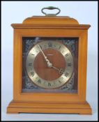 A 20th Century walnut cased Smith's ' Tempora ' bracket clock with brass dial and Roman numeral