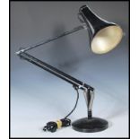 A vintage 20th Century Herbert Terry Anglepoise industrial desk lamp finished in black enamel
