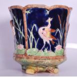 A 19th Century Majolica planter in the manner of George Jones, bamboo effect rim decorated with