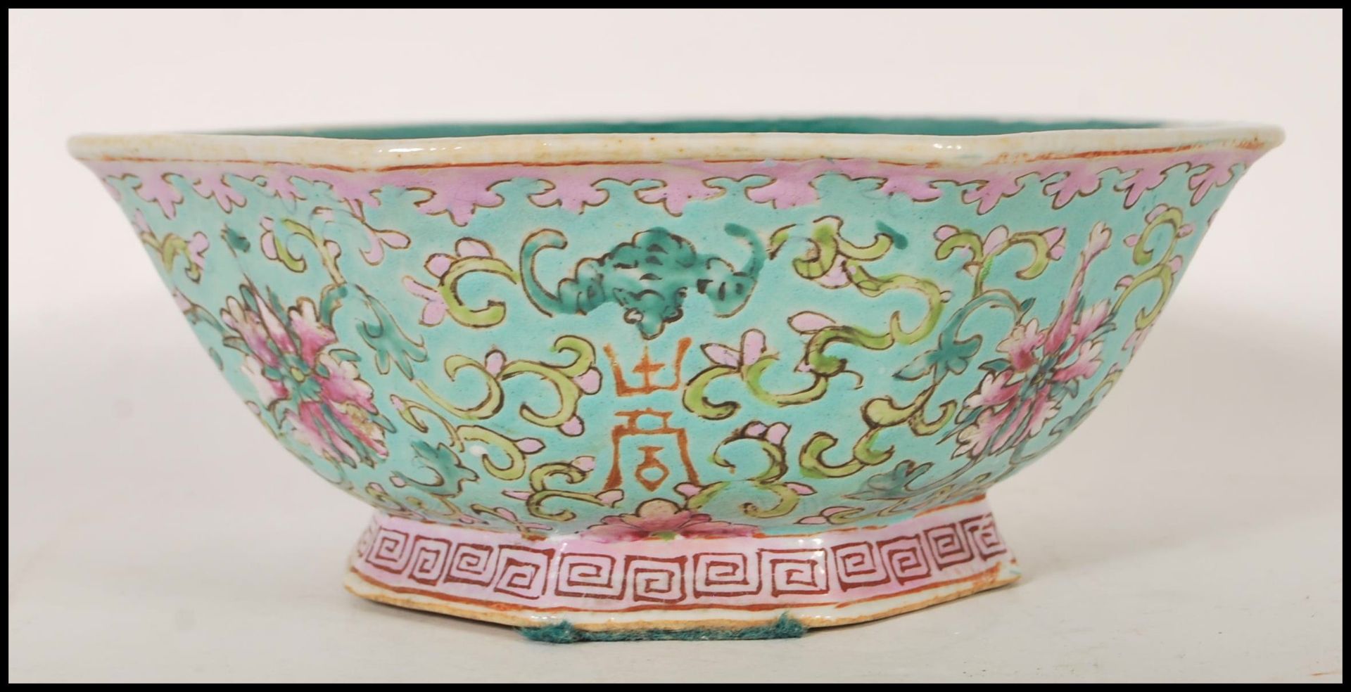 A Chinese Cantonese ( Canton ) footed centerpiece bowl of octagonal form having a blue ground