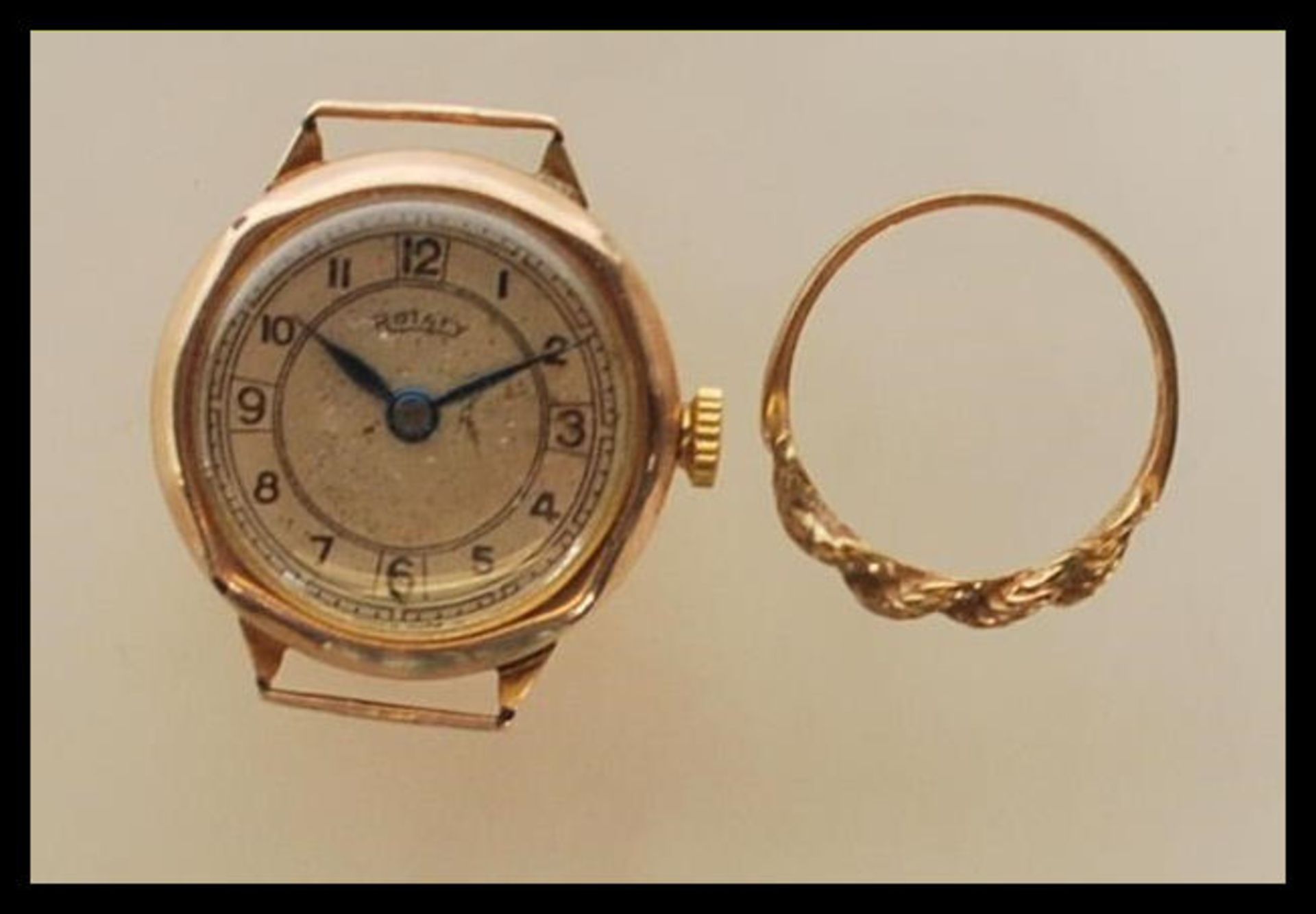 A mid 20th Century 9ct gold case Rotary wrist watch having a round face with arabic numerals to