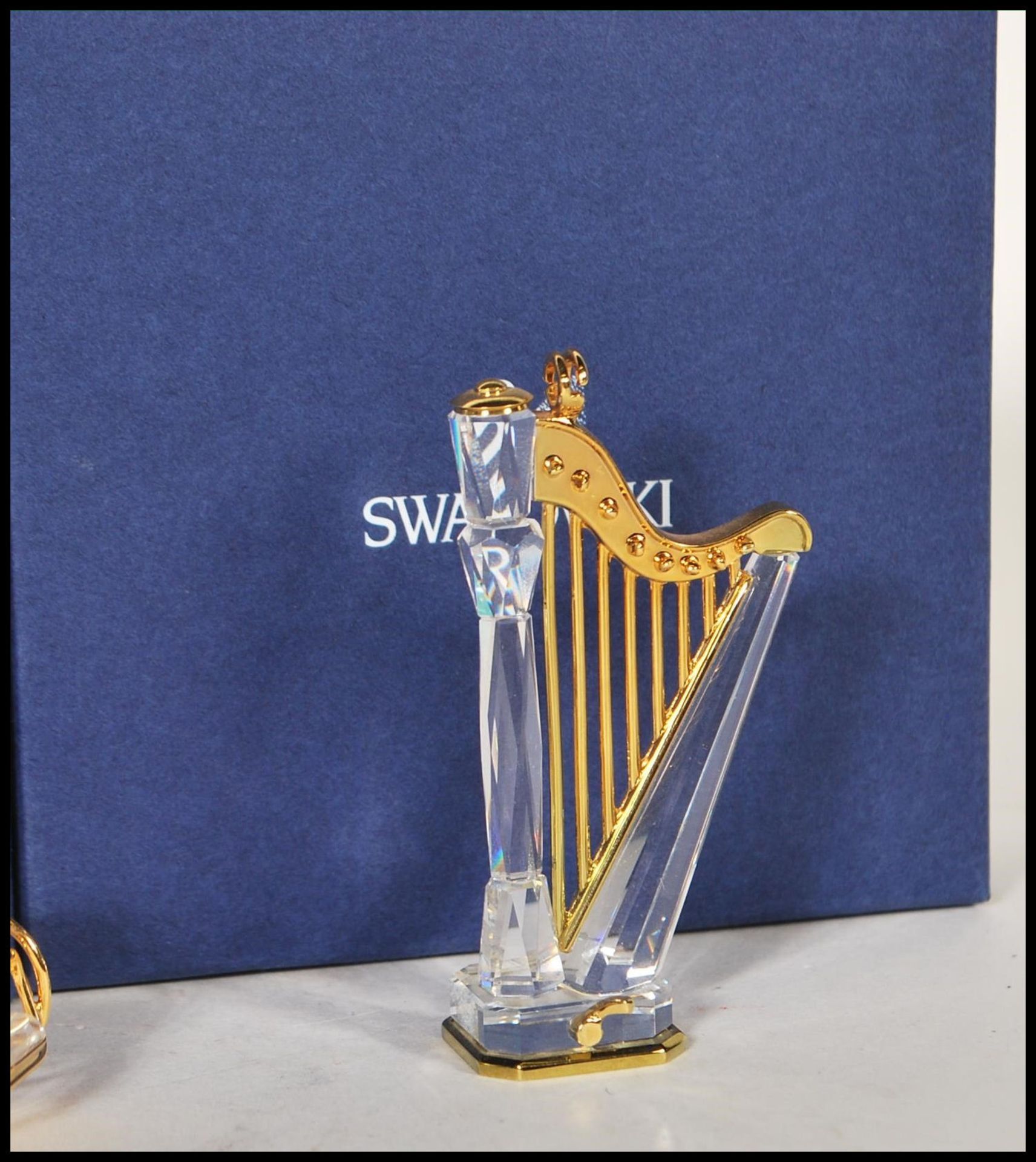 Swarovski - A collection of cut glass crystal figurines to include a harp, a globe, a rocking chair, - Bild 7 aus 7