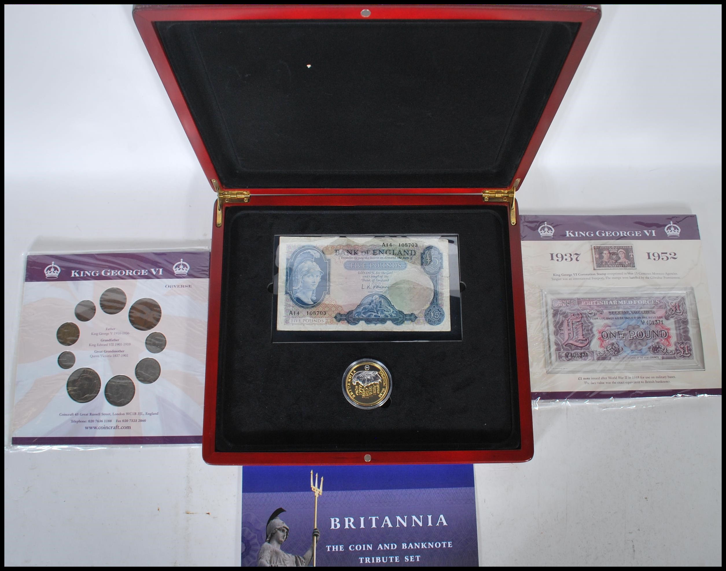 BRITANNIA THE COIN AND BANKNOTE TRIBUTE SET with a certificate, in a fitted case, blue Bank of