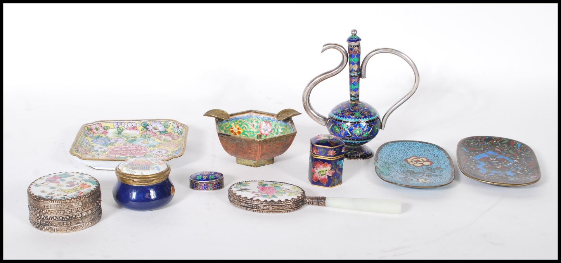 A collection of 20th Century enamel wares to include two Chinese Cloisonne dishes one decorated with