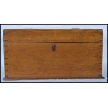 A 19th century Victorian pine bible box having a lock to front. The hinged lid opening to reveal a