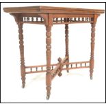 A late 19th Century Victorian card table, fold over baize lined top with gallery frieze raised on