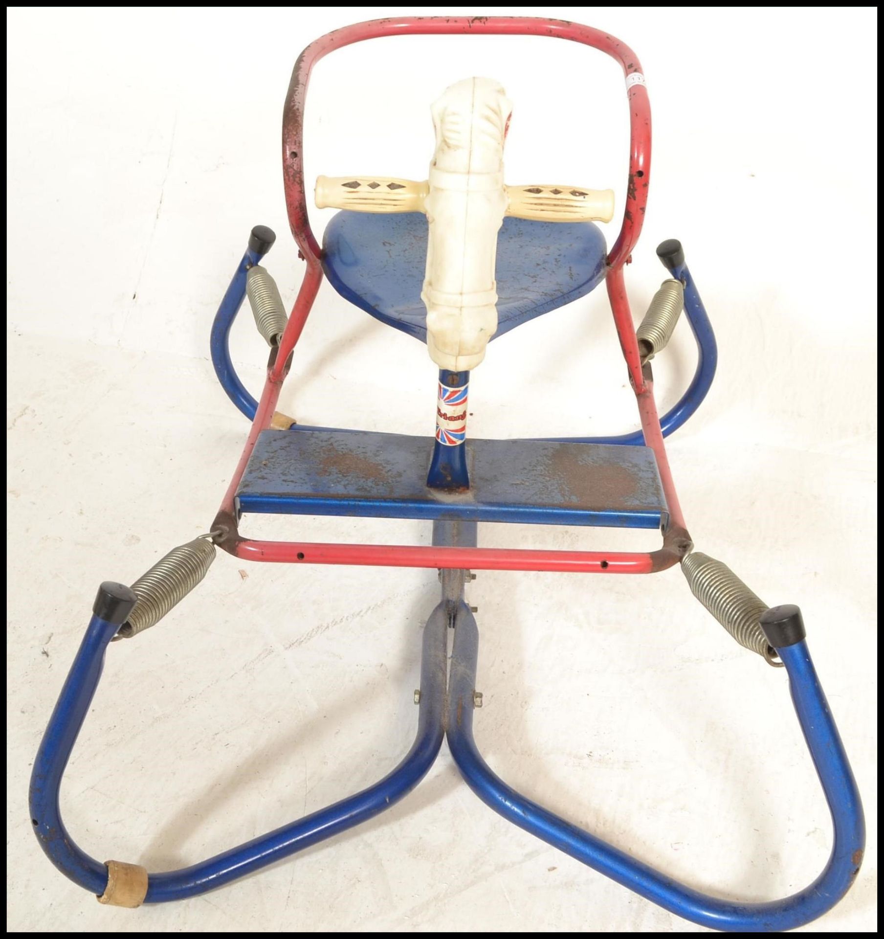 A vintage / retro mid century childs  tin plated Triang rocking horse set on springs on a tubular - Bild 4 aus 5