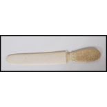 A 19th Century Chinese Cantonese ivory page turner / letter opener / paper knife having profusely