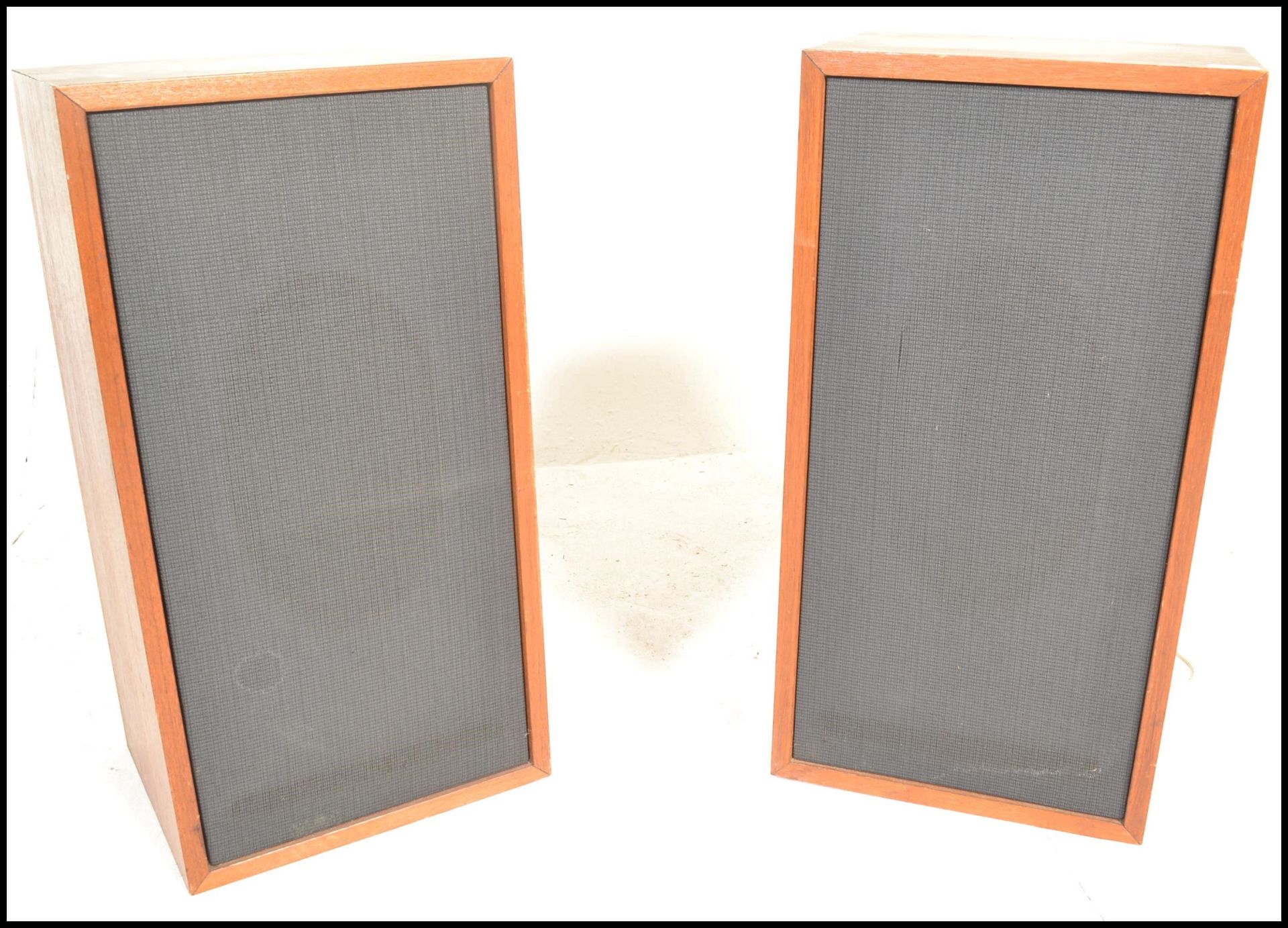 A pair of teak wood cased vintage 20th Century speakers, removable mesh cover to front. Measures