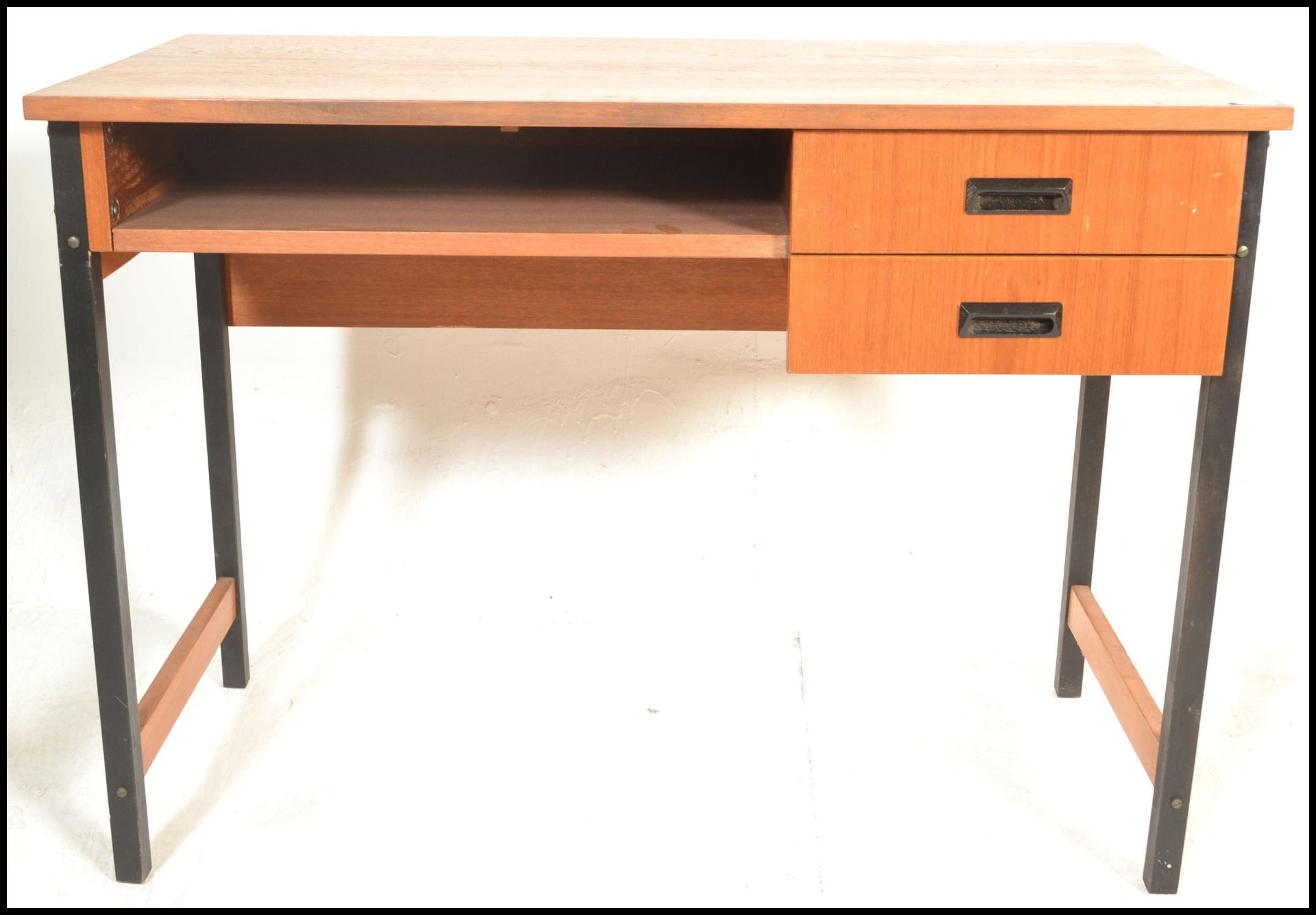 A 20th Century retro teak wood desk, raised on tubular black metal supports, two drawers to the - Bild 3 aus 6